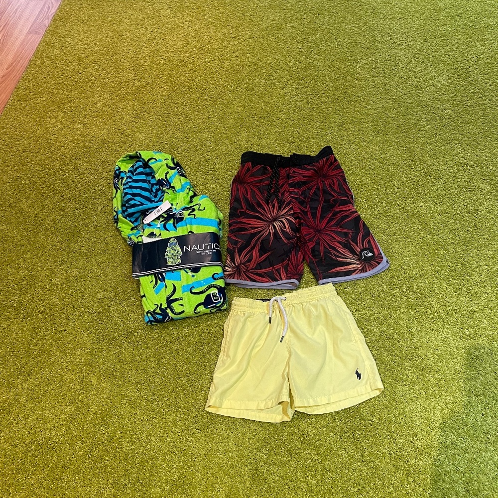 Bundle of Ralp Lauren swim trunks, quicksilver swim trunks and cover up.